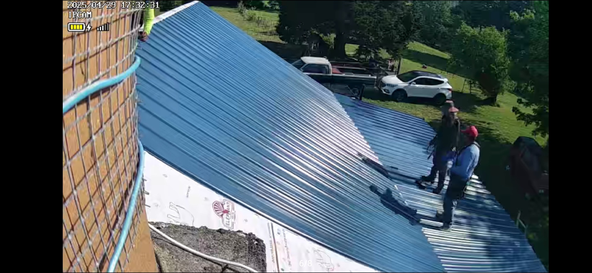 New metal roof being installed